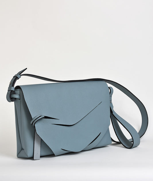 Handmade misty blue grey Italian genuine leather handbag, crossbody clutch with unique wrist strap by Hungarian, Budapest based designer. Szürke kék bőr designer válltáska, táska, magyar táskatervező márka.