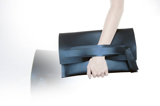 lindasieto sculptural horizontal slashed clutch signature archival design