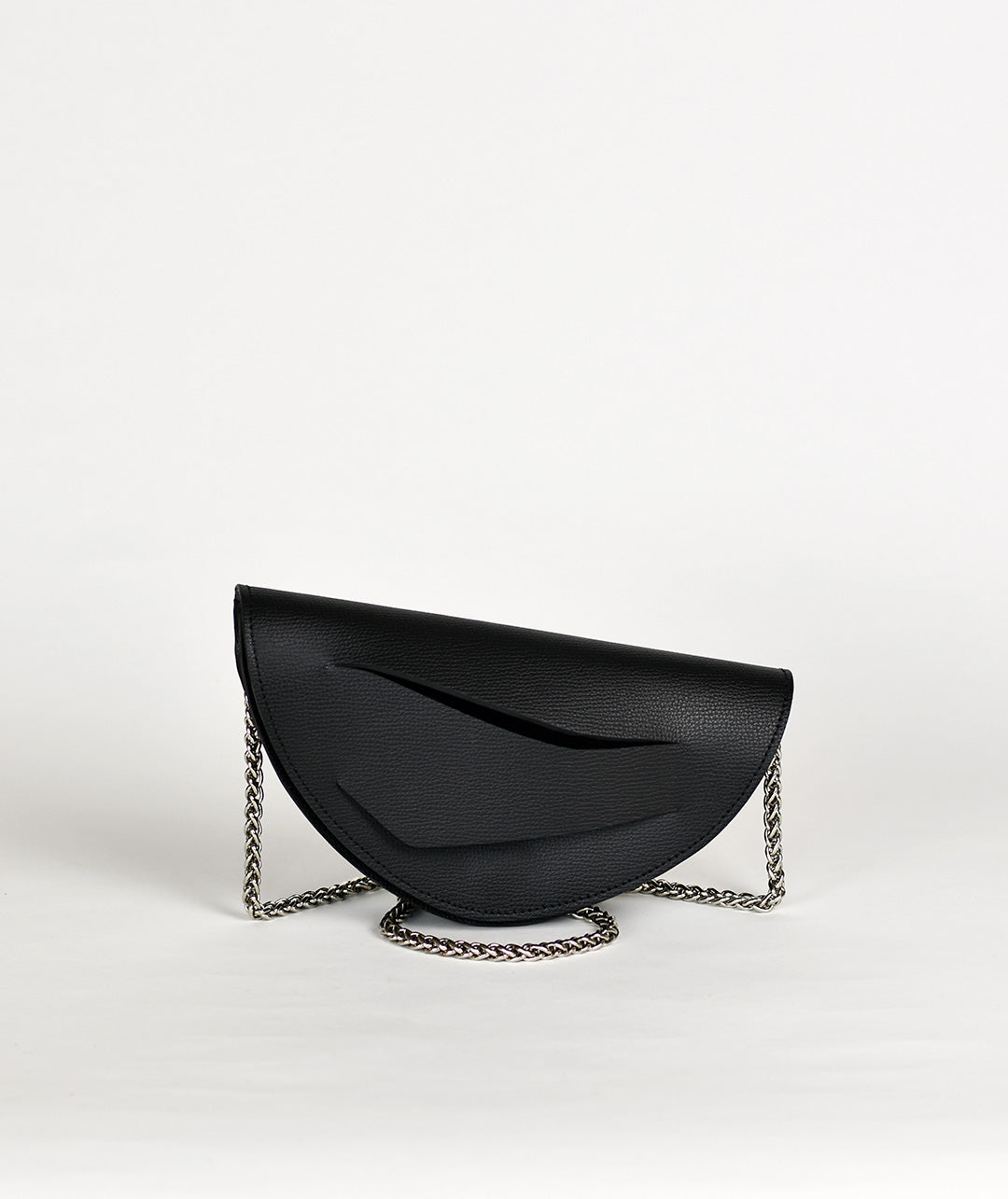 Handmade clutch bag, genuine Italian leather, custom colors, black handbag, crossbody purse with unique wrist strap by Hungarian, Budapest based designer. Fekete bőr designer borítéktáska, táska, válltáska magyar táskatervező márka.