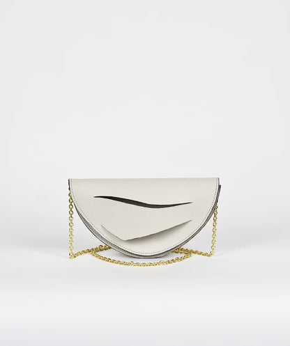 fehér designer bőr magyar clutch táska off_white_handbag_half moon crossbody_purse_with_unique_wrist_strap_by_Hungarian_Budapest_based
