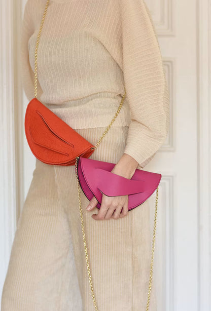 Handmade red silver vegan handbag, crossbody, clutch bag with unique wrist strap by Hungarian, Budapest based designer. Bőr designer válltáska, táska márka, magyar tervező.