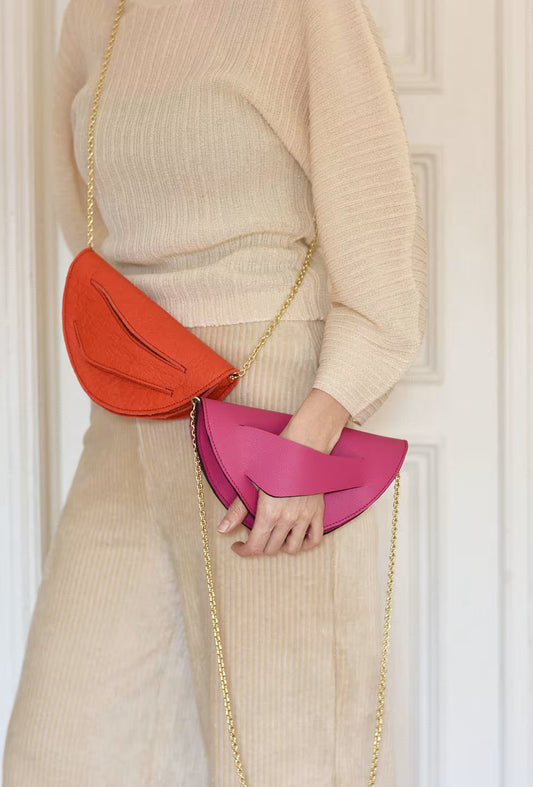 Handmade red silver vegan handbag, crossbody, clutch bag with unique wrist strap by Hungarian, Budapest based designer. Bőr designer válltáska, táska márka, magyar tervező.