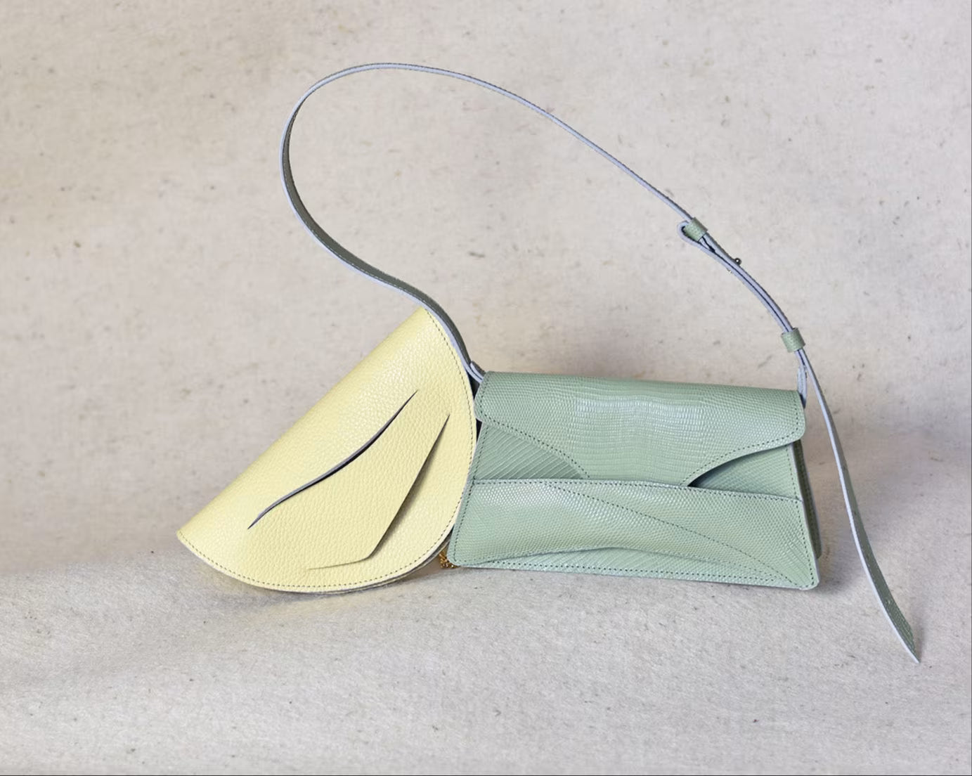 Two premium contemporary leather handbags, Link Bag in light melon green, and Dune Bag in lemon cream yellow, crafted by Budapest based fashion brand by Linda Sieto. Zöld és sárga, valódi bőr designer alkalmi táska, 2026 tavaszi színek, magyar tervezői lindasieto válltáska.