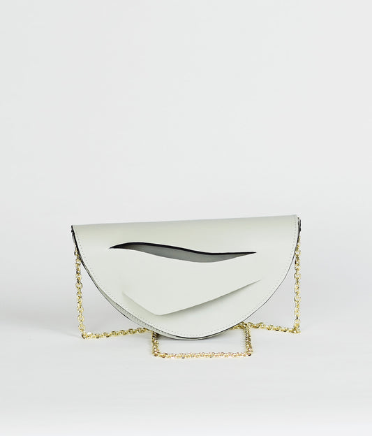 Handmade clutch bag handcrafted from genuine Italian leather, custom colors, off white light green handbag, crossbody purse with unique wrist strap by Hungarian, Budapest based designer. Fehér zöld választható színű bőr designer borítéktáska, táska, válltáska magyar táskatervező márka.