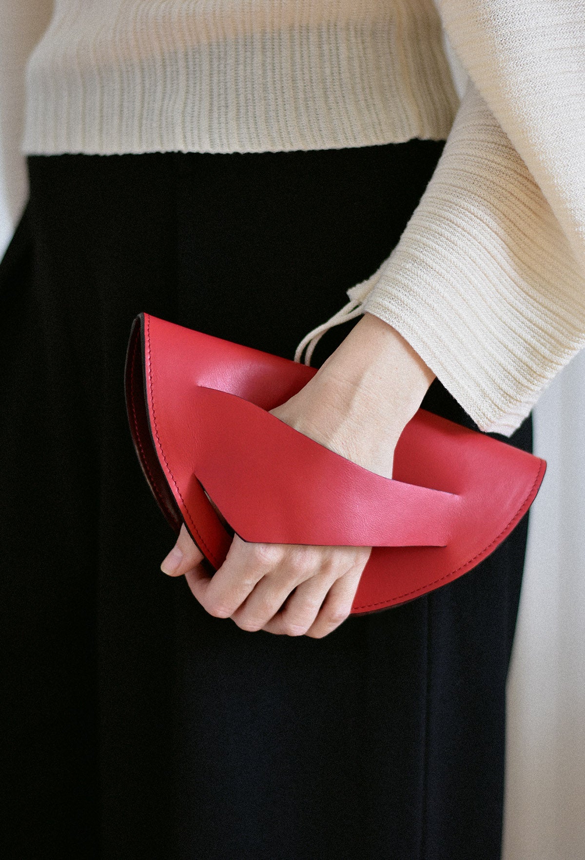 piros dune bag magyar designer bor taska lindasieto red leather halfmoon clutch to crossbody bag, unique wrist strap