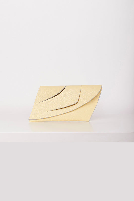 Handmade bridal clutch bag genuine Italian leather, yellow handbag, purse with unique wrist strap by Budapest based designer. Sárga, vajsárga bőr magyar designer táska, borítéktáska, magyar táska tervező márka.