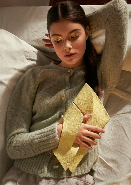 Handmade bridal clutch bag genuine Italian leather, yellow handbag, purse with unique wrist strap by Budapest based designer. Sárga, vajsárga bőr magyar designer táska, borítéktáska, magyar táska tervező márka.