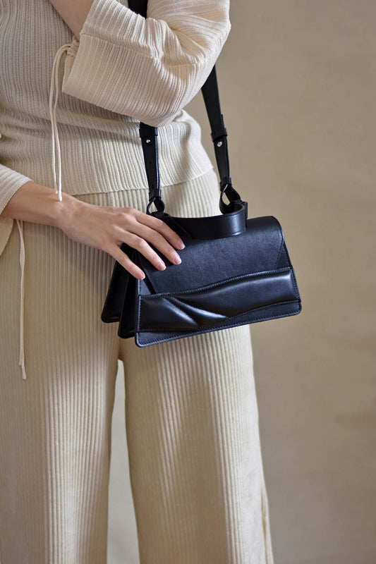 Lindasieto  structured black Mini Balance  designer bag, handcrafted from Italian leather, black handbag, crossbody purse with unique wrist strap by Budapest based independent designer. Magyar designer különleges egyedi bőr fekete táska, csukló pánt, női, uniszex válltáska, különleges színekben, személyre szabott felirattal, monogrammal, ajándék csomagolással, magyar tervező, márka.