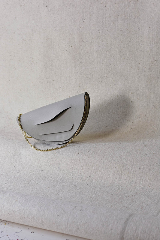 Handmade bridal,wedding clutch bag handcrafted from genuine Italian leather,or vegan custom colors, elegant, white handbag, crossbody purse with unique wrist strap,anniversary gift by Budapest,EU based designer. Elegáns, egyedi, fehér, designer borítéktáska, menyasszonyi táska, válltáska magyar táskatervező márka.